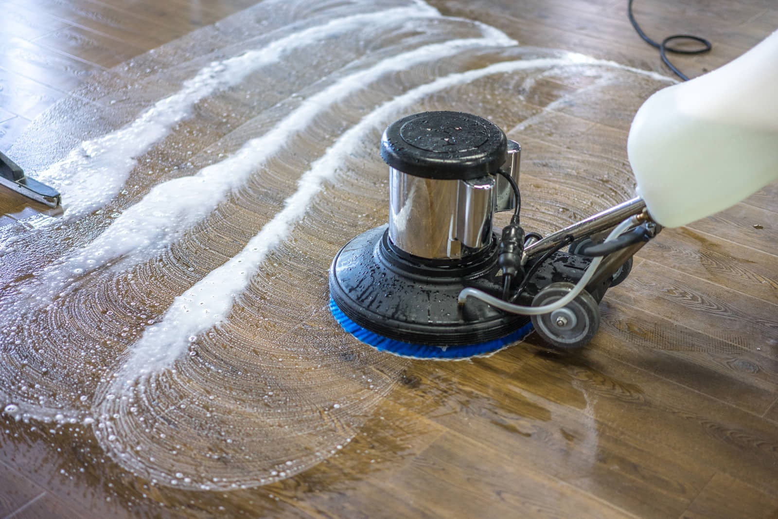 Commercial floor-cleaning machine in use